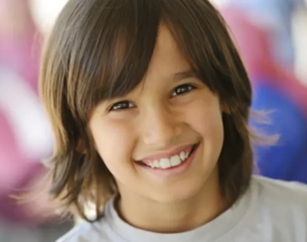 Smiling kid after his haircut
