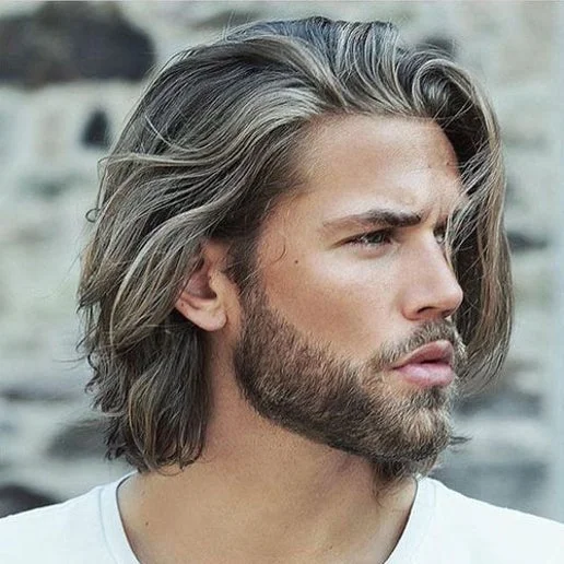 Longer men's hairstyle swept back